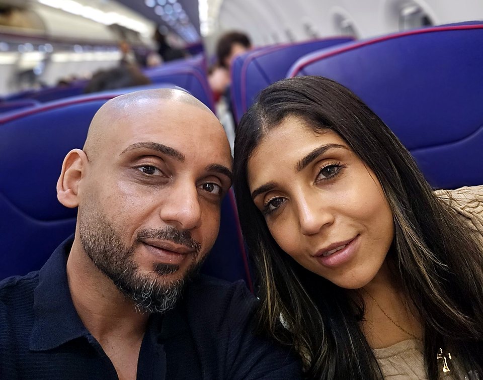 H and Dolly, who run Sussex Airlink, in their seats on a plane